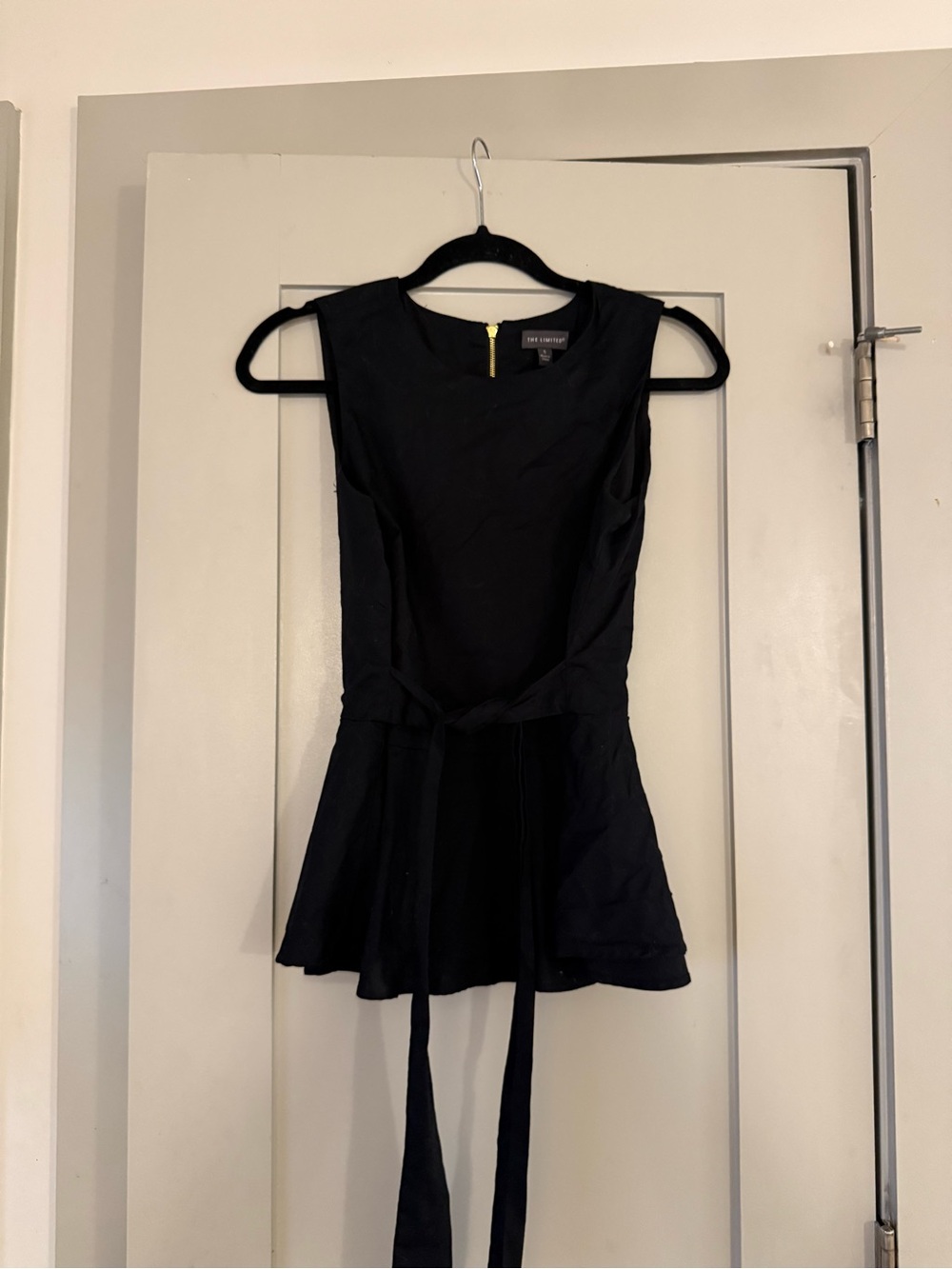 The Limited Black Sleeveless Peplum Top with Waist Tie